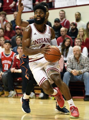 Indiana Hoosiers guard Robert Johnson (4) drives to the basket during the game against Illinois at Simon Skjodt Assembly Hall in Bloomington, Ind., on Wednesday, Feb. 14, 2018.