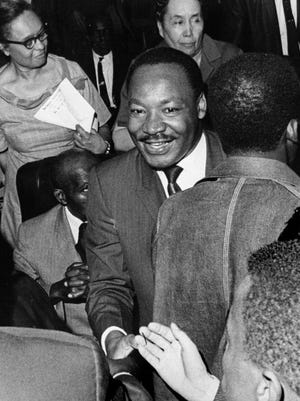 Copyright, The Commercial Appeal files Dr. Martin Luther King Jr. is greeted at Mason Temple on March 18, 1968. Dr. King was born Jan. 15, 1929.