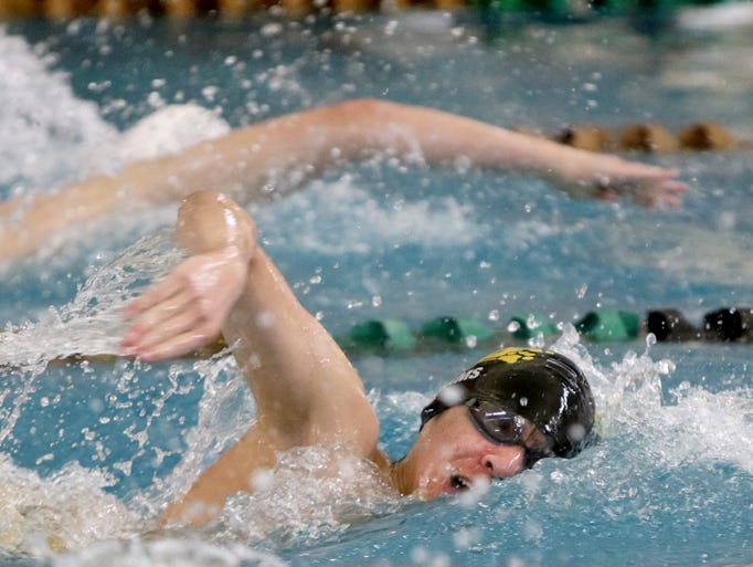 New Berlin's Kevin Adams swims the 200-yard freestyle