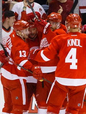 Pavel Datsyuk (13) scored twice as the Red Wings won their second straight.