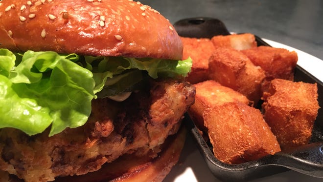 Deep fried Springer Mountain chicken sandwich with house made potato tots is a new Tuesday evening special at Knox Mason