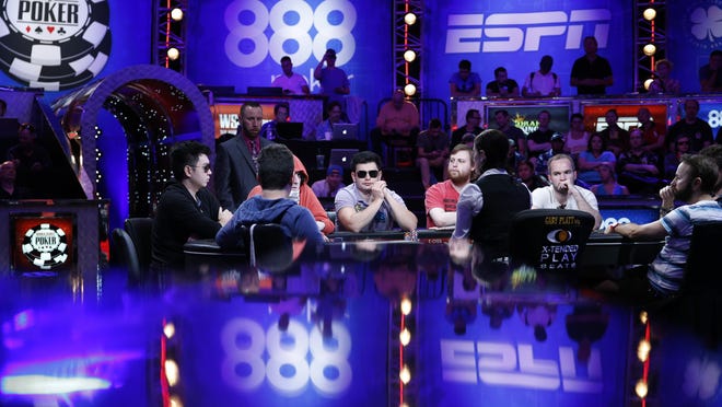 Players compete at the World Series of Poker main event Tuesday, July 14, 2015, in Las Vegas.