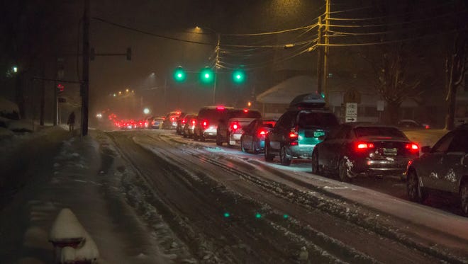 Traffic on Colchester Avenue headed toward Winooski during a snow storm on Dec. 10, 2014.