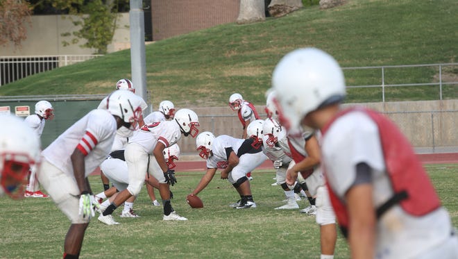 Palm Springs High School football team practices for their opening game on August 28, 2015. 