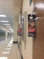 Door hangers about opioid abuse placed on the classroom