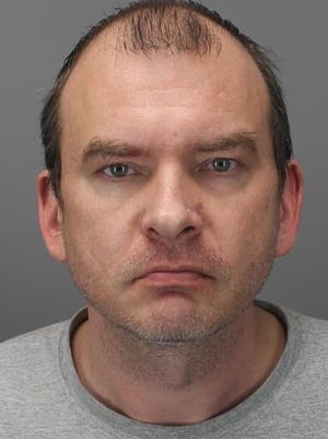 Anthony Modrzejewski, 39, has been charged with having child porn, videotaping unclothed person.