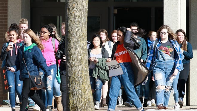 Students join the nationwide school walkout Wednesday, March 14, 2018, at Wausau West High School in Wausau, Wis. T'xer Zhon Kha/USA TODAY NETWORK-Wisconsin