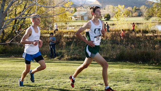 Poudre High School's Bryce Pietenpol, left, and Fossil Ridge High School's Dylan Ko are two of the local qualifiers for Saturday's state meet. Ko won last week's regional race in Fort Collins.
