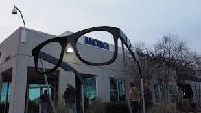 Eyewear company informed Tennessee officials it will permanently lay off 208 people at Memphis facility.