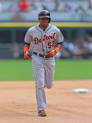 Detroit Tigers left fielder Yoenis Cespedes (52) runs the bases after hitting a solo home run during the sixth inning against the Chicago White Sox at U.S Cellular Field.