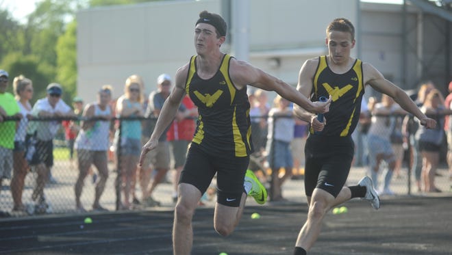 Brody Martin races in the 4x200 at regionals last weekend.
