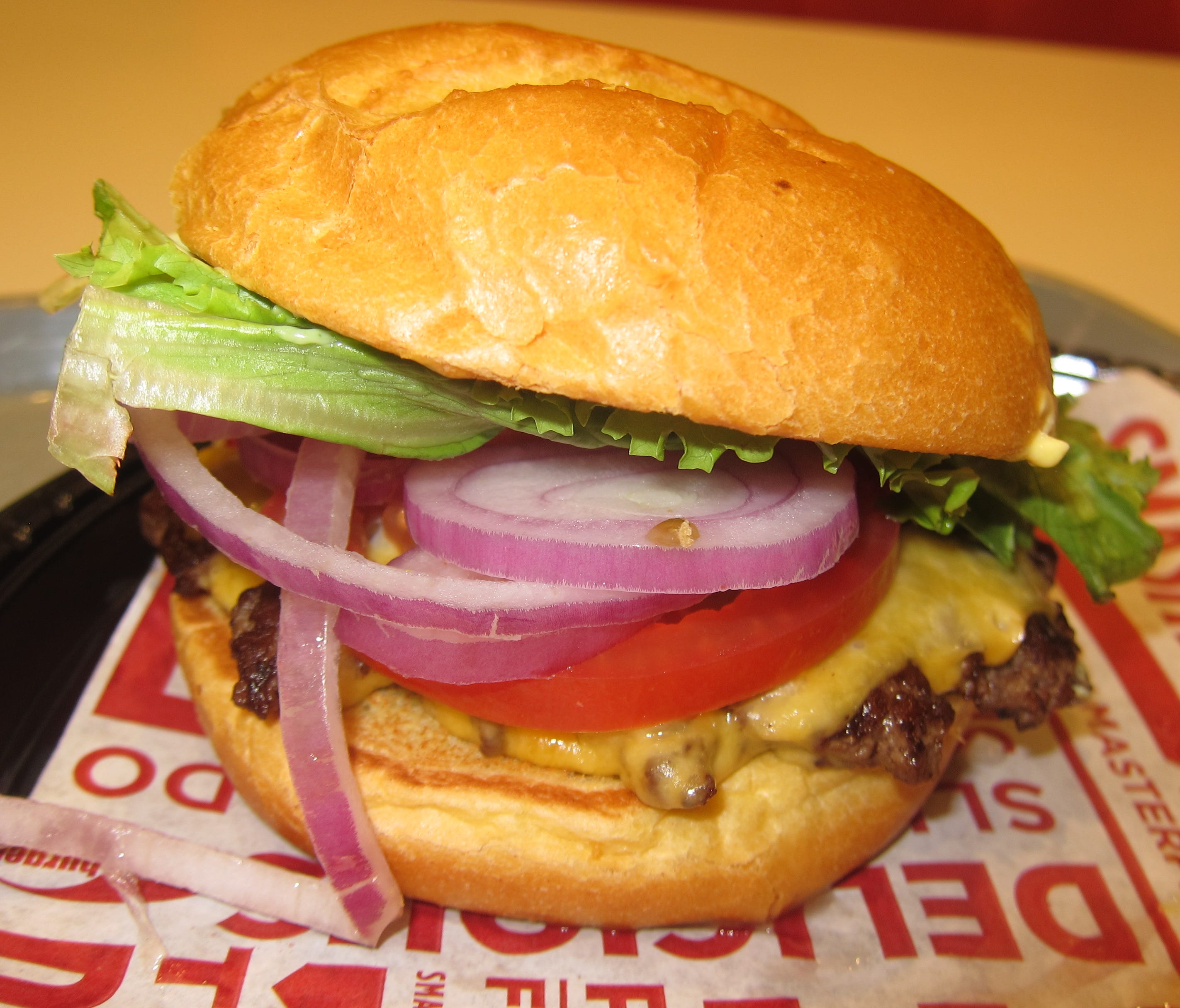 Smashburger's Classic Smash assembled - all the burgers are served on a high-quality egg bun.