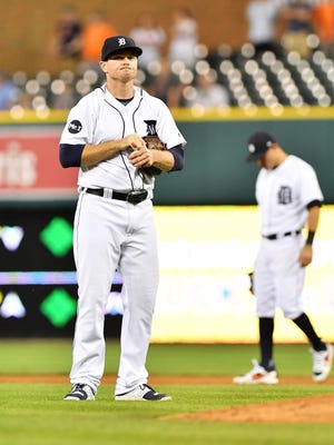 Tigers pitcher Justin Wilson stands near the mound after Orioles' Mark Trumbo's solo home run to tie the game in the ninth inning on Tuesday night.