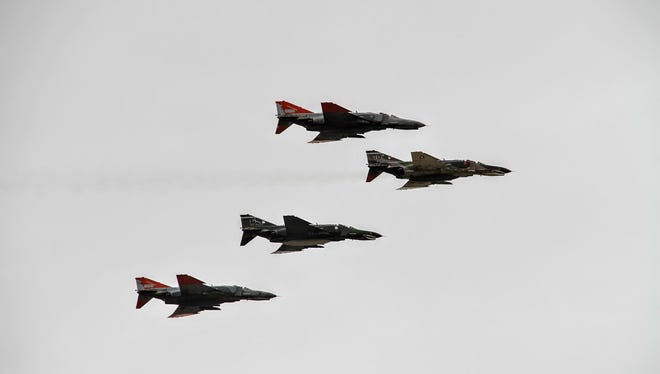 F-4 Phantom II jets fly over Holloman Air Force Base during its final flight Wednesday, Dec. 21.