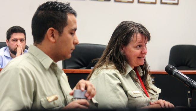 Deputy District Ranger Andres Bolaños and Sacrament District Ranger Beth Humphrey discuss the Southern Sacramento Restoration Project at a Feb. 9 Otero County Commission meeting.