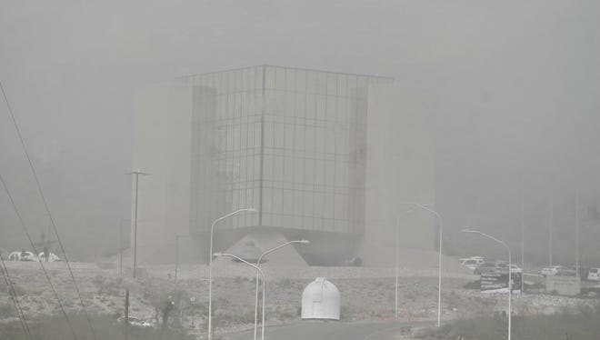 High winds in Otero County caused low visibility on Thursday making the New Mexico Museum of Space History difficult to see.