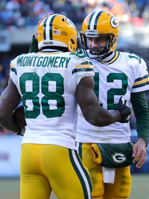 Aaron Rodgers congratulates Ty Montgomery on his third quarter touchdown.
