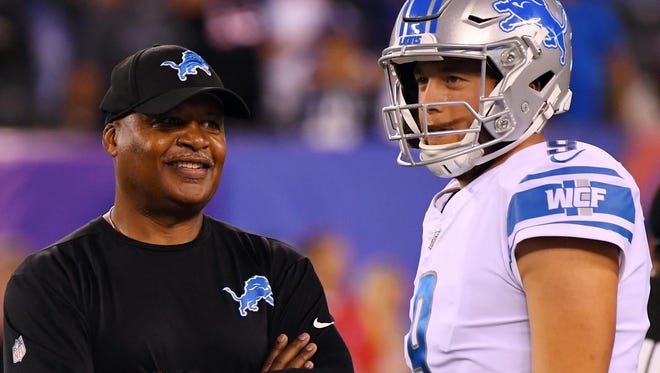 Lions coach Jim Caldwell with quarterback Matthew Stafford (right) before a game against the Giants at MetLife Stadium on Monday, Sept. 18, 2017.