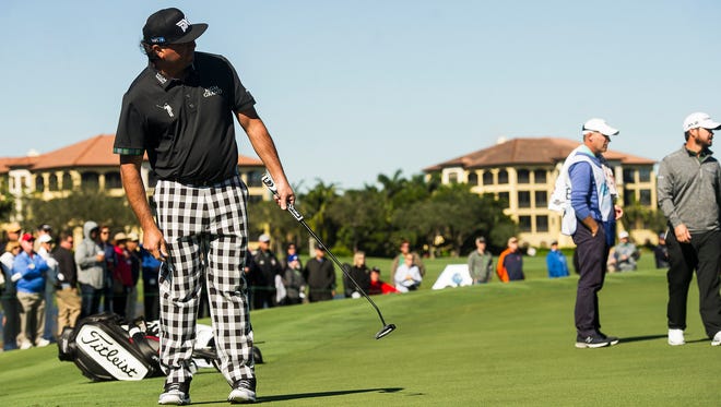 Pat Perez watches his putt on the 18th hole during the final round of the QBE Shootout at Tiburón Gulf Club in Naples, Fla., on Sunday, Dec. 10, 2017. 
