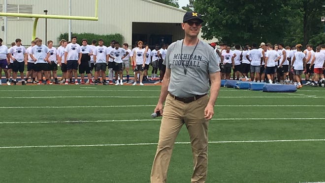 Michigan coach Jim Harbaugh and UT Martin coaches held a joint football camp Saturday.