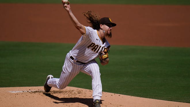 San Diego Padres starting pitcher Mike Clevinger works against a Los Angeles Angels batter during the first inning of a baseball game Wednesday, Sept. 23, 2020, in San Diego. (AP Photo/Gregory Bull)