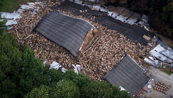 An aerial view of the fully collapsed bourbon-aging barn at the Barton’s 1792 distillery in Bardstown, Kentucky. After half of the barn collapsed on June 22nd, the other half collapsed on the Fourth of July holiday. July 5, 2018