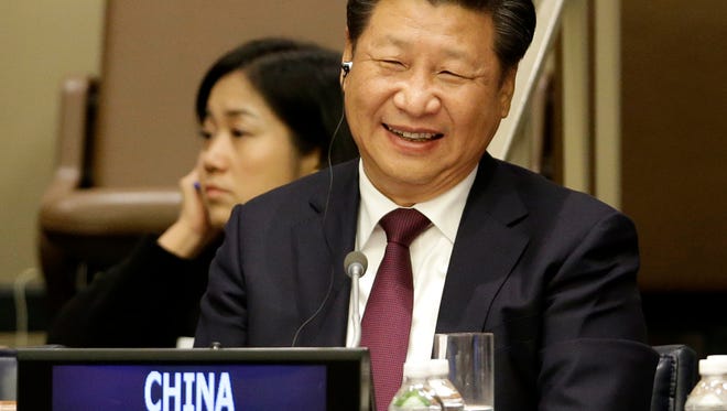 Chinese President Xi Jinping attends a meeting on gender equality and women's empowerment at United Nations headquarters on Sunday.