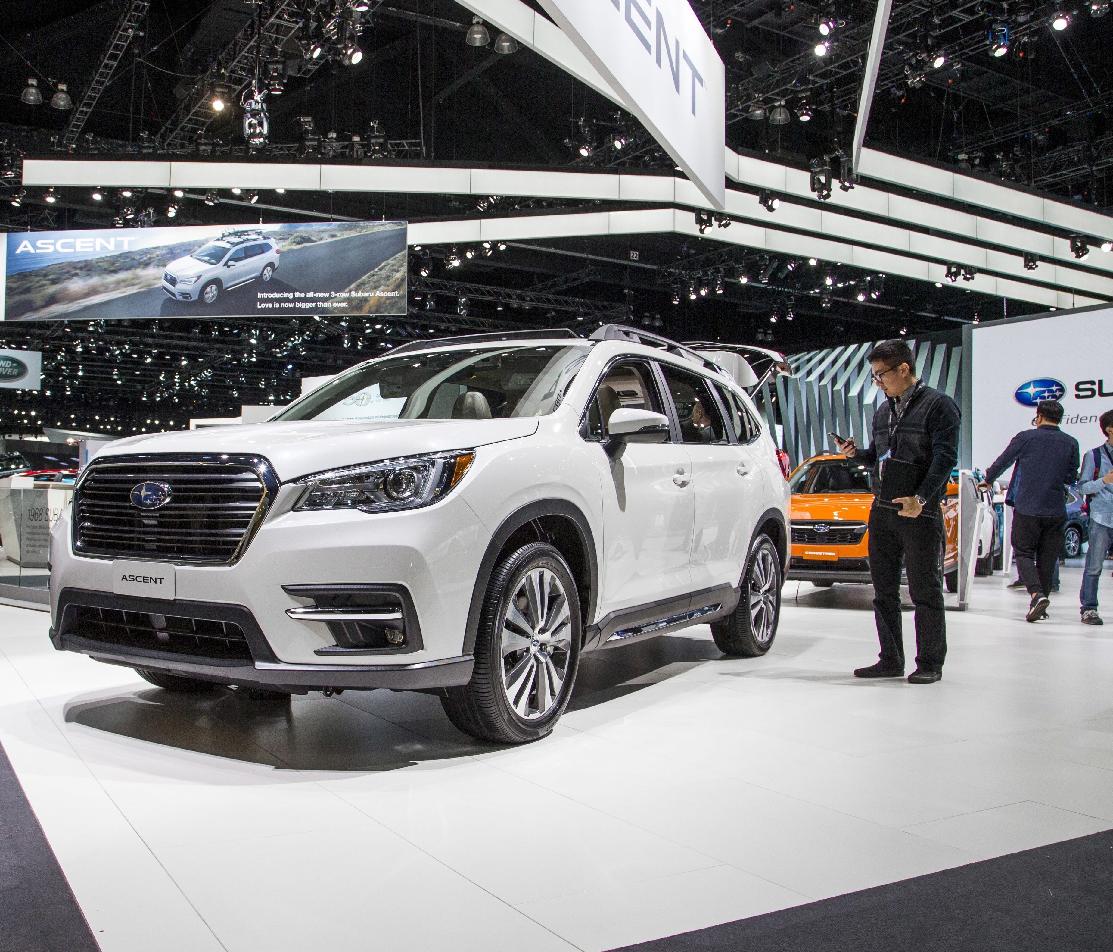 This photo provided by Edmunds shows Subaru's booth at the 2017 Los Angeles Auto Show. Shoppers can use such shows as a one-stop fact-finding mission for their next car purchase. They can ask questions of the experts at the displays, get hands-on exp