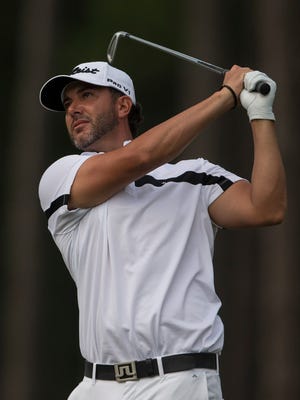 Scott Piercy hits his tee shot on the 17th hole during the final round of the Barbasol Championship golf tournament Sunday. Piercy finished 6-under 65 for a three-stroke victory and his third PGA title.