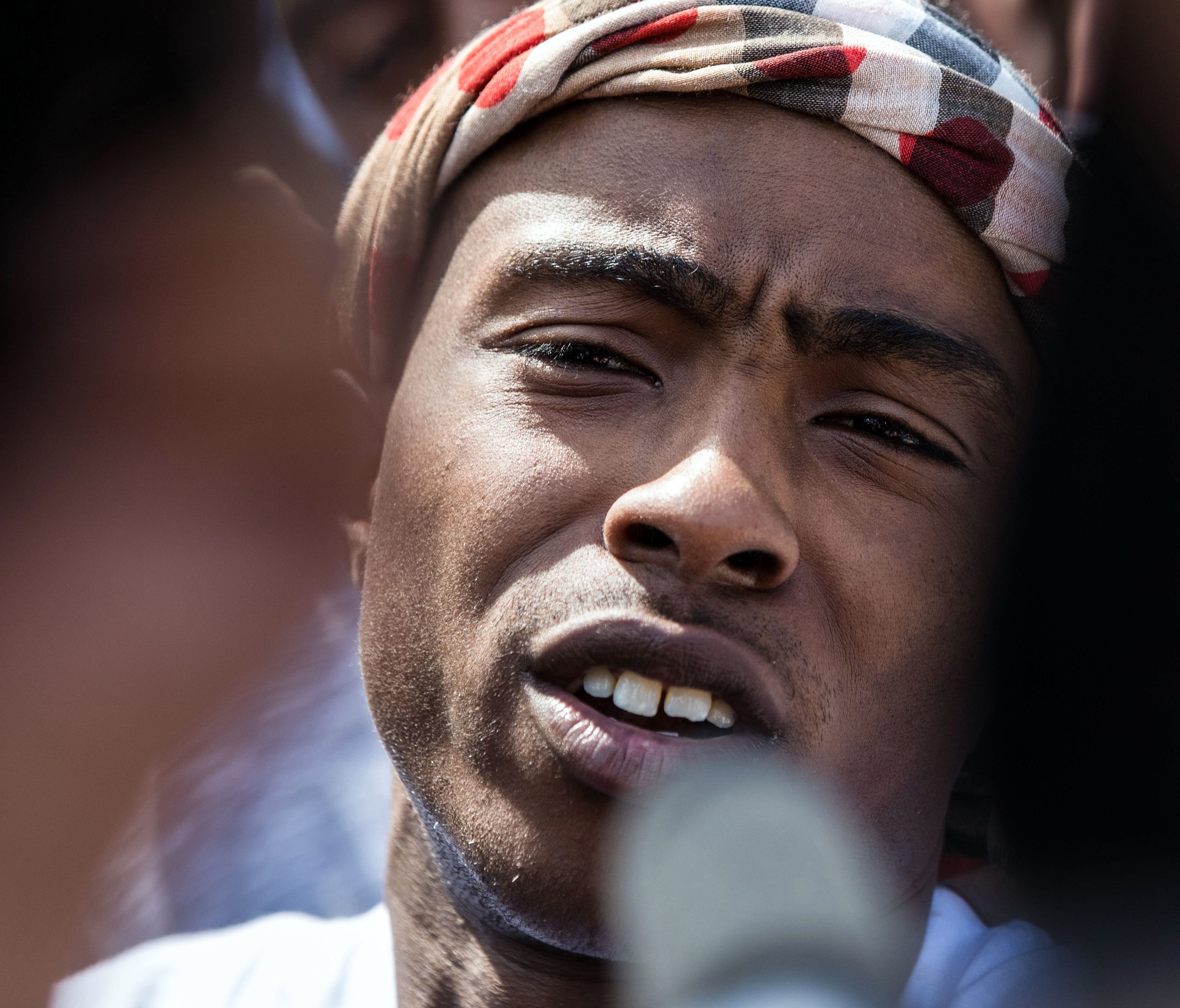 Stevante Clark talks to the media after the funeral of his brother Stephon Clark, Thursday.