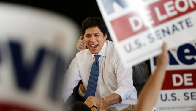 State Sen. Kevin de Leon shakes hands with supporters during an event held to formally announce his run for U.S. Senate on Wednesday in Los Angeles.