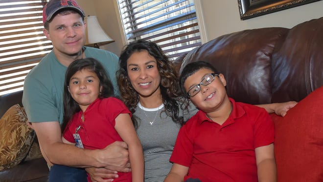 Gary and  Gisely Godeaux with their children, Gary Joe and Gabriella.