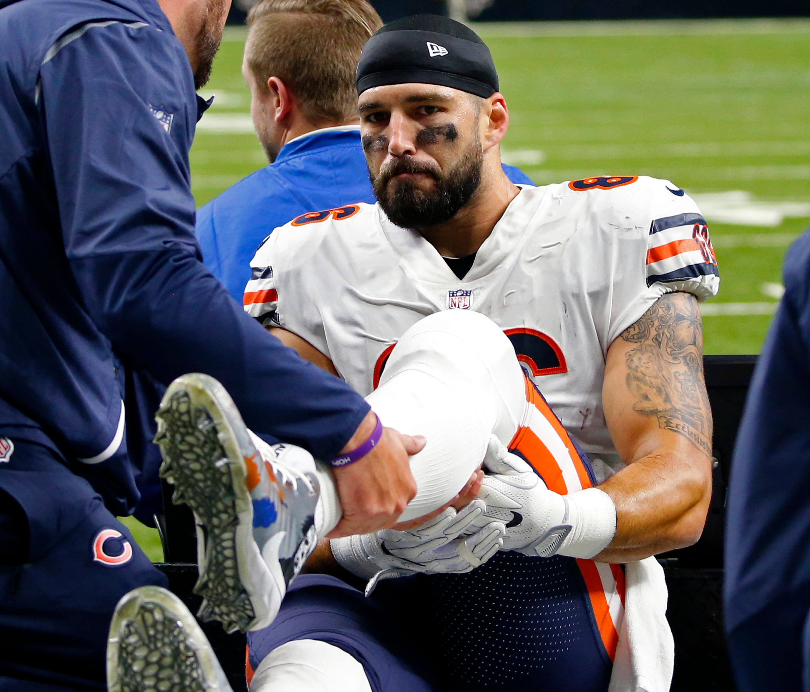 File-This Oct. 29, 2017, file photo shows Chicago Bears tight end Zach Miller (86) being taken off the field on a cart, after injuring his leg in the second half of an NFL football game against the New Orleans Saints in New Orleans.  After eight surg