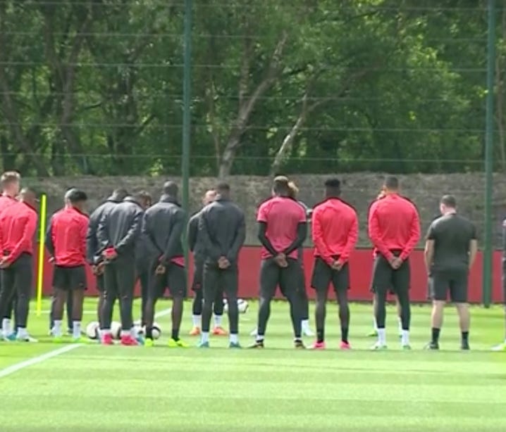 Manchester United stopped practice to honor victims of Monday's terror attack.