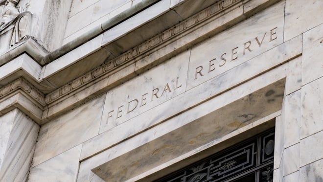 The facade of a Federal Reserve building.
