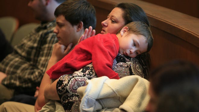 Nancy Weymers and her adopted son, Anthony Weymers, attend an Adoption Day event in 2011.