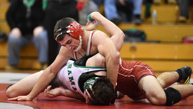 Chris Grecco (top) set a new Pompton Lakes record on Friday.