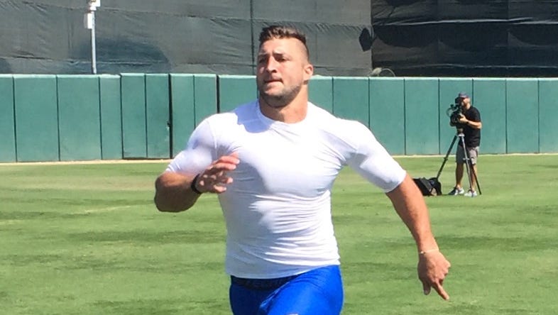 Tim Tebow displays power, earns mixed scouting reviews at MLB workout