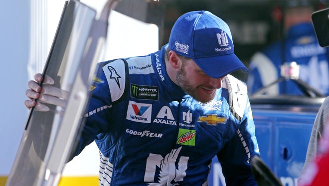 Dale Earnhardt Jr. gets into the medical cart after a wreck in Sunday's Daytona 500.