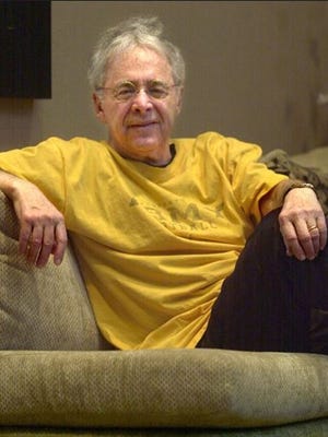 In this Dec. 20, 2002 file photo, Chuck Barris, the man behind TV's "The Dating Game," poses in the lobby of his apartment in New York. Game show impresario Barris has died at 87. Barris, the madcap producer of "The Gong Show" and "The Dating Game," died of natural causes Tuesday,  March 21, 2017, at his Rockland County home in Palisades.