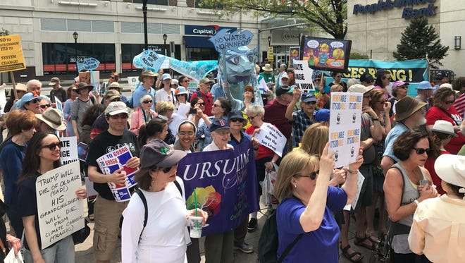Hundreds gathered in downtown White Plains for the People's Climate March, April 29, 2017.