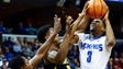 Memphis guard Jeremiah Martin (right) drives the lane