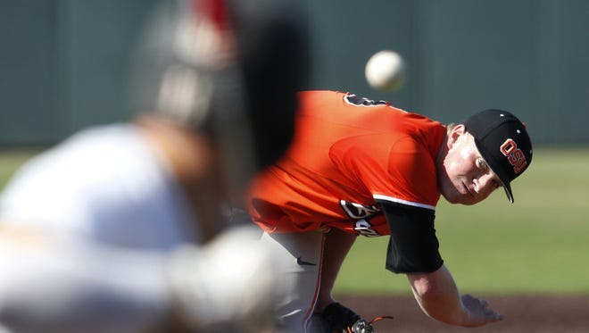 Oregon State starting pitcher Drew Rasmussen throws to a Virginia Commonwealth batter in the sixth inning during an NCAA college baseball tournament regional game Sunday, May 31, 2015, in Dallas. VCU won 5-1.