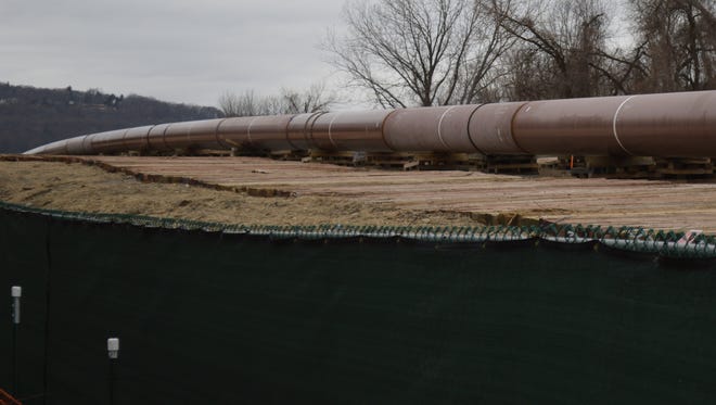The 42-inch pipe for the Spectra Algonquin pipeline stands ready for installation in February in Verplanck.