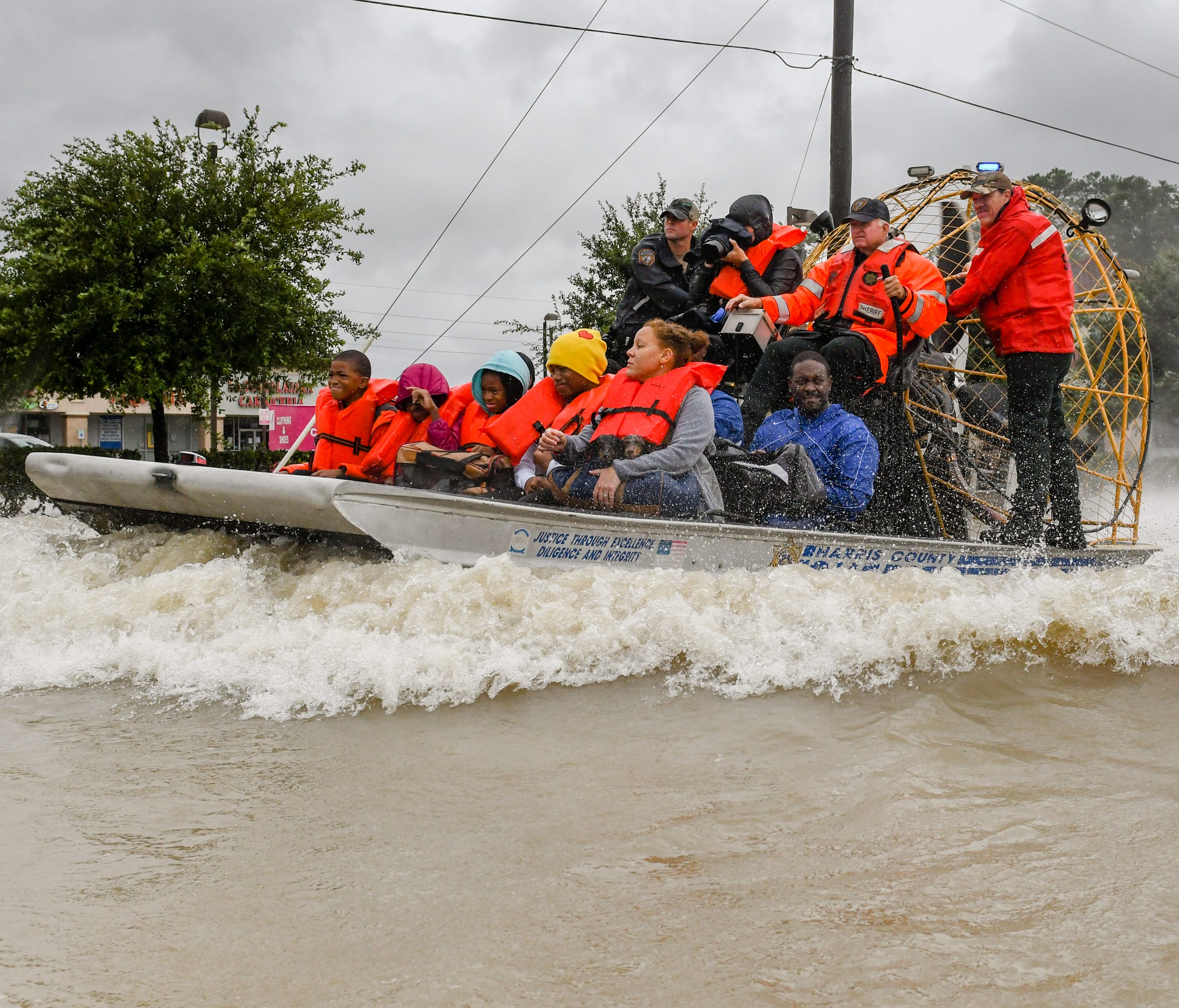 Volunteers and first responders rescue residents from rising flood waters in Houston on Aug. 29, 2017.