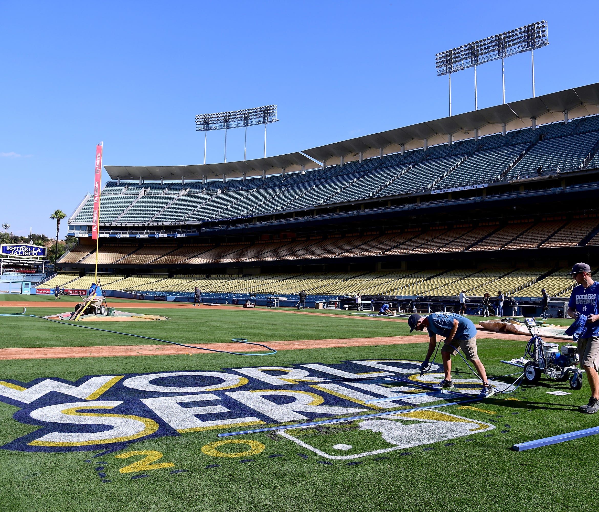 Dodger Stadium preparations are underway for the World Series, which may bring a game-time temperature in the mid-90s.