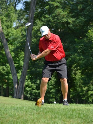 Mike Tungate hits off the tee during the final day of the City Senior Golf Championship at Binder Park Golf Course.