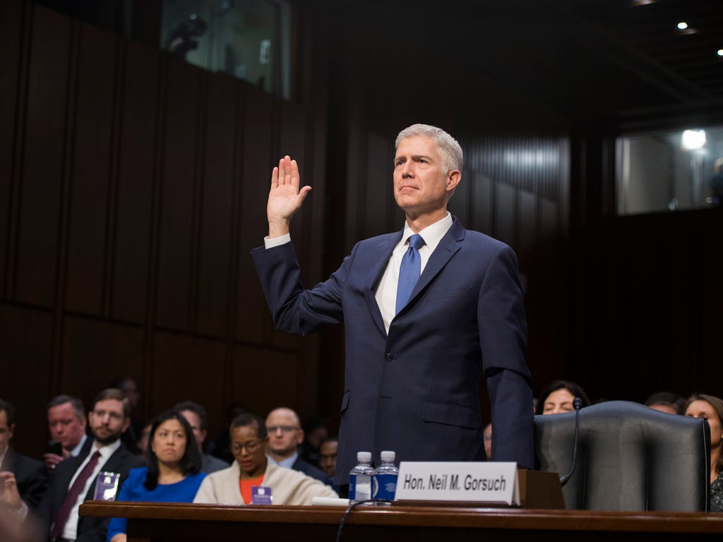 Supreme Court nominee Neil Gorsuch is sworn in before he testifies before the Senate Judiciary Committee during his confirmation hearing in Washington. Judge Gorsuch was nominated by President Trump to replace Supreme Court Justice Antonin Scalia.