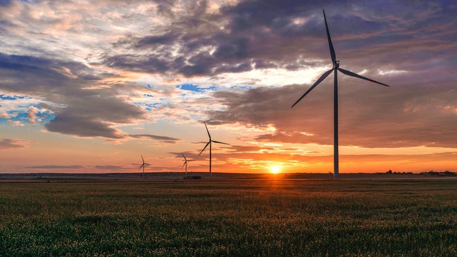 WEC Energy Group will have invested more than $1.2 billion in wind farms in the Midwest with the purchase announced Monday.