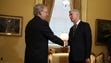 Senate Majority Leader Mitch McConnell shakes hands